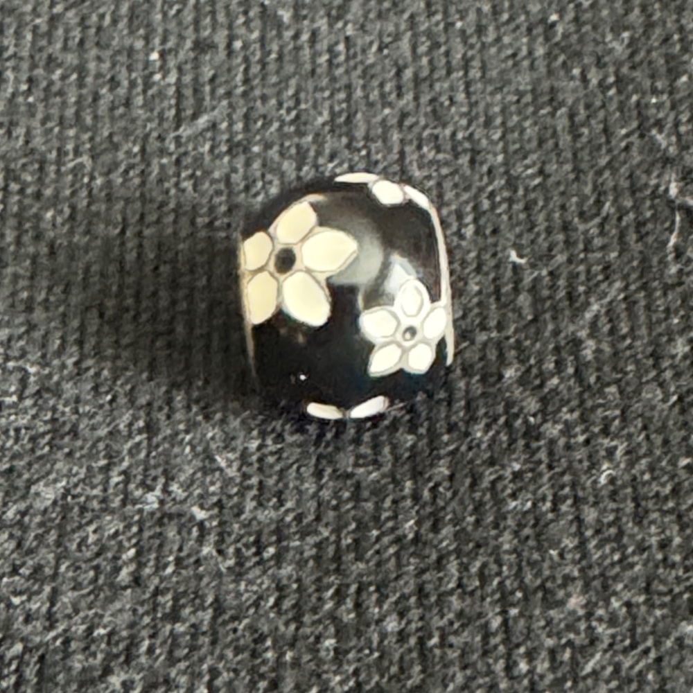 Pandora Mystic Flower Charm with Black Enamel
Retired